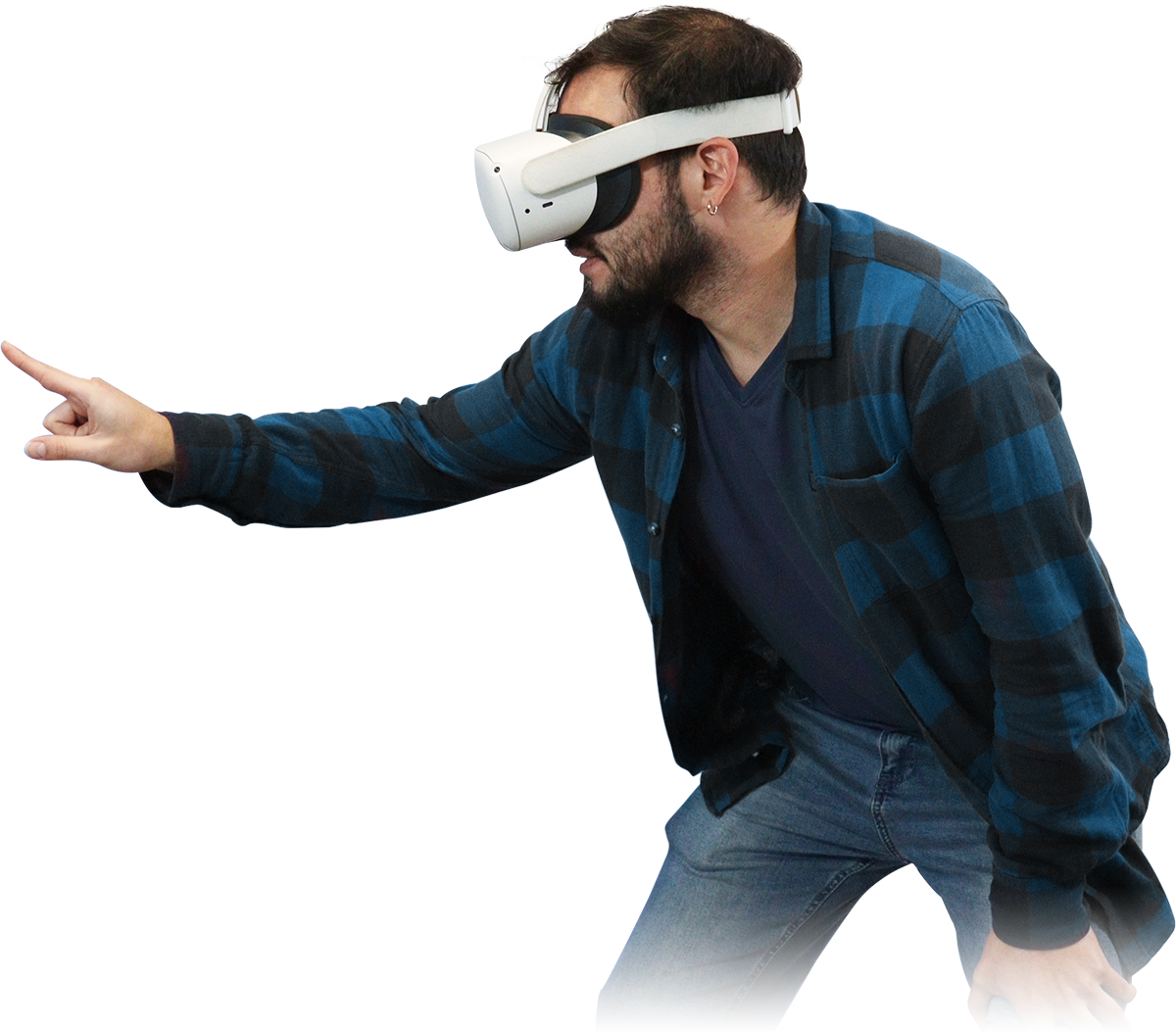 Homme portant un casque VR, pointant du doigt.