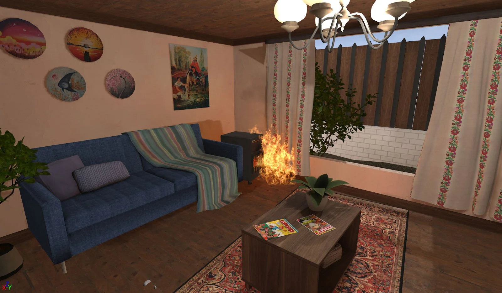 Living con sofá azul, arte de pared, una mesa pequeña, una planta y una chimenea con llamas visibles.