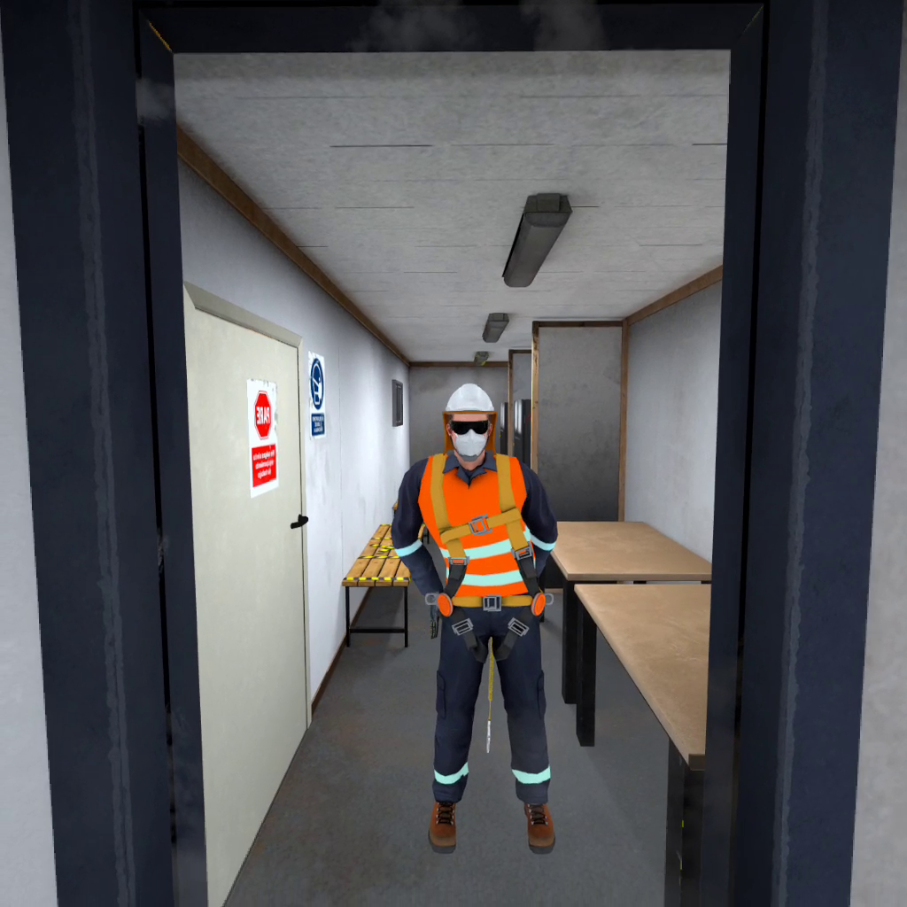 Person wearing safety gear in a hallway with benches and tables.