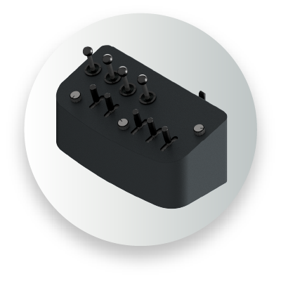 Black electronic switch module with multiple toggle switches on a light gray background.